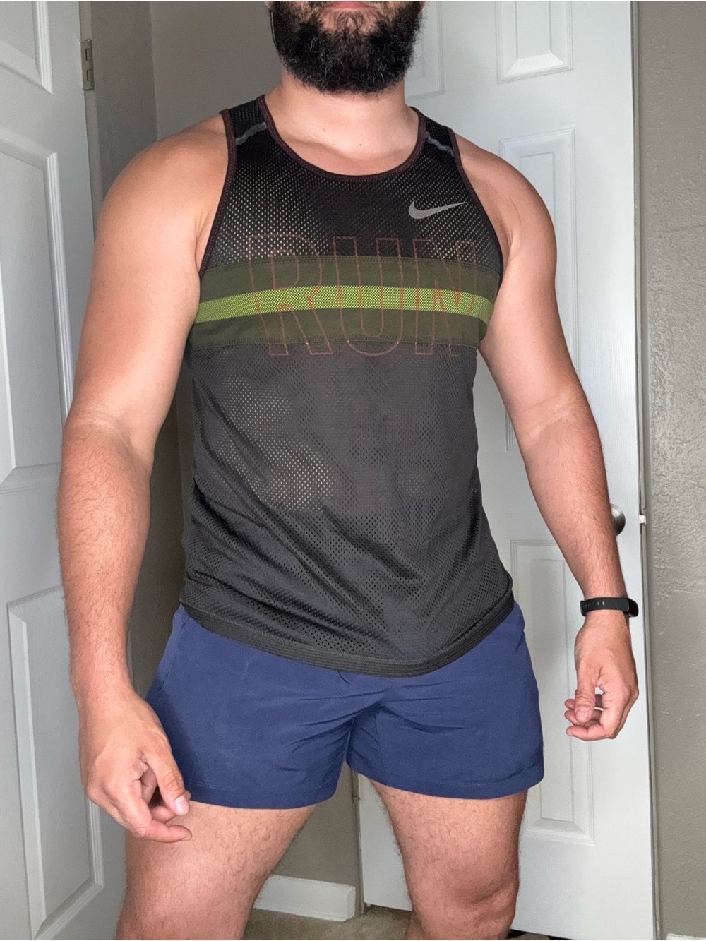 NIKE Black Mesh Tank with Green Stripe and Orange Accents